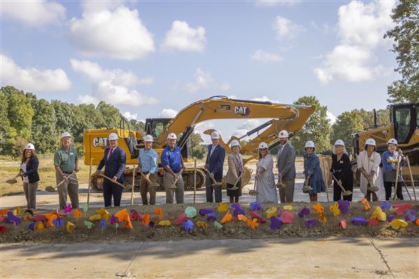 Groundbreaking: School board members, Mayor Alexander, Superintendent Withers and former teachers Margaret Basinger shovel dirt.