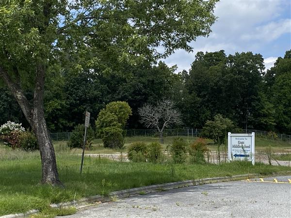 View of mpty lot after demo.